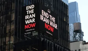 A billboard secured by the National Iranian American Council (NIAC) displays a message in Times Square on April 8, 2026 in response to a rapidly escalating war. A US official said Wednesday that a 10-point ceasefire plan published by Iran is not the same set of conditions that were agreed to by the White House for pausing the war. (Photo by TIMOTHY A. CLARY/AFP)