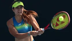 Croatia's Petra Marcinko hits a return to Germany's Tatjana Maria during their women's singles match on day two of the Australian Open tennis tournament in Melbourne on January 19, 2026. (Photo by DAVID GRAY/AFP)/-- IMAGE RESTRICTED TO EDITORIAL USE - STRICTLY NO COMMERCIAL USE --