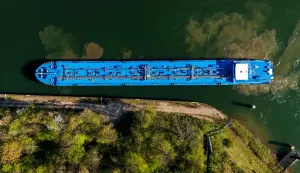 An aerial view shows a tanker near the fuel depot of Aral at the Ruhr Oel petroleum refineries of BP Gelsenkirchen GmbH in Gelsenkirchen, western Germany on April 7, 2026. The Iran war sent oil prices soaring on March 9, 2026 after Tehran, under new leader Mojtaba Khamenei, fired a new barrage of missiles at its Gulf neighbours and signalled that the strategic Strait of Hormuz would likely remain shut.With the Strait of Hormuz off Iran remaining closed to almost all oil tankers, the price of benchmark crude oil contracts rocketed past 0 a barrel on Monday -- their highest levels since Russia's invasion of Ukraine in 2022 -- before edging back slightly. (Photo by Ina FASSBENDER/AFP)