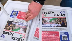 (FILES) The opposition TISZA party's newspaper TISZTA Hang (Clean Voice) is on display at an electoral campaign booth in the streets of Budapest on February 14, 2026, two months ahead of the general election. Thanks to the TISZA party's on-the-ground network, Hungarian Prime Minister Viktor Orban's grip on small towns like Jaszfenyszaru, population 6,000, appears to be weakening ahead of the April 12 vote. (Photo by Attila KISBENEDEK/AFP)