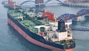 This picture taken on March 26, 2026 shows an oil tanker unloading crude oil at a port in Yantai, in China?s eastern Shandong province. (Photo by CN-STR/AFP)/China OUT