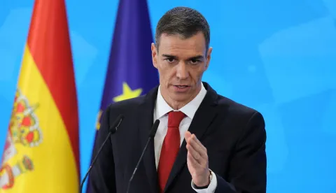 (FILES) Spain's Prime Minister Pedro Sanchez gestures during a press conference at the Moncloa Palace in Madrid on December 15, 2025. Spain on March 12, 2026 explained its decision to permanently withdraw its ambassador to Israel, citing repeated "insults and slanders" by the country. The diplomat has first been recalled from Tel Aviv in September after Spanish Prime Minister Pedro Sanchez unveiled measures designed to "stop the genocide in Gaza, pursue its perpetrators and support the Palestinian population". (Photo by Thomas COEX/AFP)