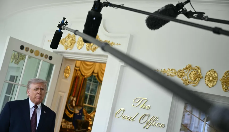 US President Donald Trump speaks to reporters outside the Oval Office at the White House, in Washington, DC, April 13, 2026. (Photo by Brendan SMIALOWSKI/AFP)