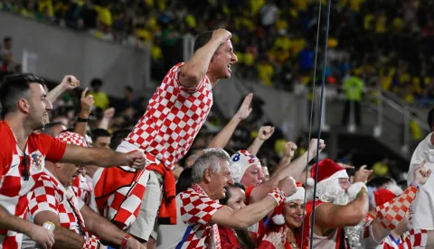 Croatia fans cheer for their team during a friendly football match between Brazil and Croatia at Camping World Stadium in Orlando, Florida, on March 31, 2026. (Photo by MIGUEL J RODRIGUEZ CARRILLO/AFP)