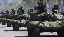 epa12392426 Serbian army M-84 tanks are shown during the 'Power of Unity' military parade marking Unity, Freedom and National Flag Day in Belgrade, Serbia, 20 September 2025. Around 6,000 troops took part alongside 4,000 in support roles, with new weapons and vehicles displayed. EPA/ANDREJ CUKIC