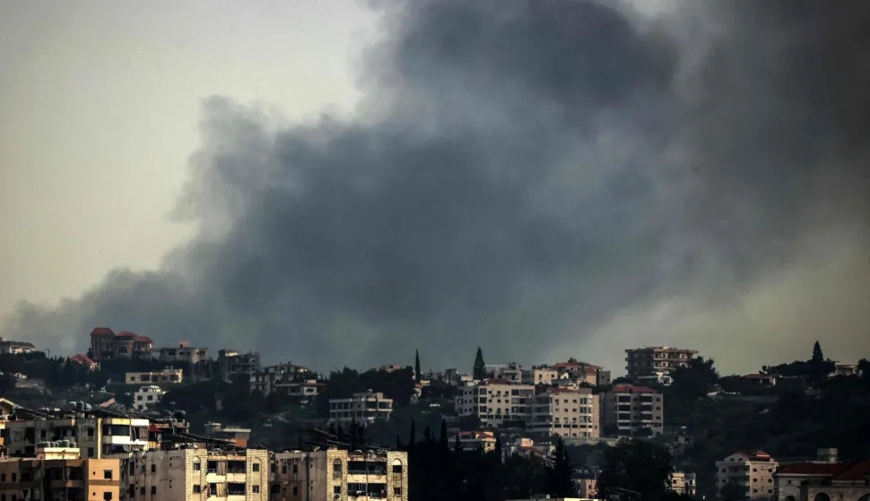 Smoke rises from the site of an Israeli airstrike that targeted the southern Lebanese town of Deir al-Zahrani on April 15, 2026. Israel hailed on April 15, the opening of direct talks with Beirut as a "historic opportunity" that could end Hezbollah's grip on Lebanon. Beirut says 2,089 people have been killed, including 166 children and 88 healthcare workers, since the war spread to Lebanon on March 2. (Photo by MAHMOUD ZAYYAT/AFP)
