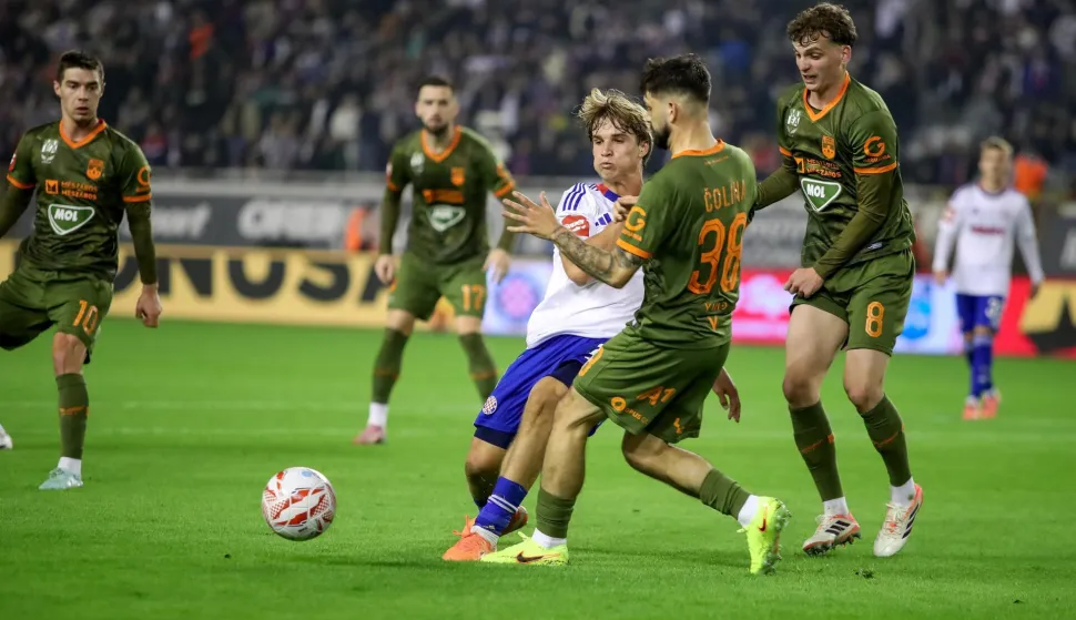08.11.2025., Split - Stadion Poljud - SuperSport HNL, 13. kolo, HNK Hajduk - NK Osijek Rokas Pukstas, Simun Mikolcic, David Colina. Photo: Sime Zelic/PIXSELL