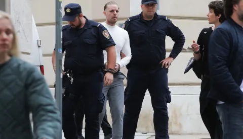 21.04.2026., Rijeka - Robert Dicaprio u pratnji policajaca dolazi na USKOK. Photo: Goran Kovacic/PIXSELL