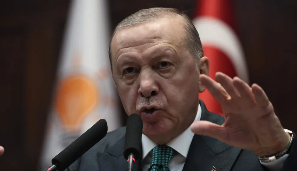 Turkish President and the leader of the Justice and Development Party (AKP) Recep Tayyip Erdogan gives a speech during his party's parliamentary group meeting at the Turkish Grand National Assembly in Ankara on February 11, 2025. (Photo by Adem ALTAN/AFP)