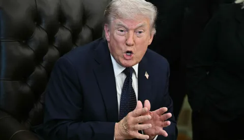 US President Donald Trump speaks during a health care affordability event where he announced a deal with pharmaceutical company Regeneron to lower drug prices, in the Oval Office of the White House in Washington, DC, on April 23, 2026. (Photo by Brendan SMIALOWSKI/AFP)