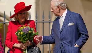 Britain's King Charles III and Britain's Queen Camilla leave St George's Chapel, in Windsor, west of London, after attending the Easter Matins Service, on April 5, 2026. (Photo by Alberto Pezzali/POOL/AFP)