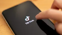 epa08578274 (FILE) - A close-up shows the video-sharing application 'TikTok' on a smart phone in Berlin, Germany, 07 July 2020 (reissued 01 August 2020). US President Trump said he intends to ban Chinese social media app TikTok. EPA/HAYOUNG JEON