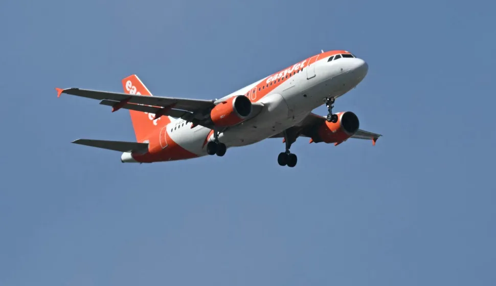An Airbus A319-111 passenger aircraft operated by EasyJet prepares to land at Liverpool John Lennon Airport in Liverpool, north west England on April 22, 2026. The EU unveiled on April 22 plans to address the energy crisis triggered by the war in the Middle East, including improved monitoring of jet fuel supplies as the prospect of shortages rattles Europe ahead of the summer travel season. (Photo by Paul ELLIS/AFP)