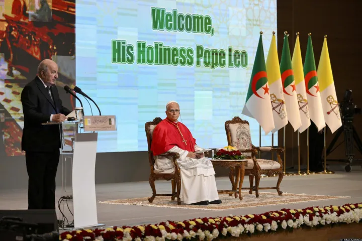 Pope Leo XIV listens to President of the People's Democratic Republic of Algeria, Abdelmadjid Tebboune during a meeting with authorities, civil society and diplomatic corps on the first day of his three-day Apostolic Journey to Algeria on April 13, 2026 in Algiers, Algeria. The Pope addressed around 1,400 civil authorities at the Djamaa el Djazair Conference Center. Photo by (EV) Matteo Pernaselci/ Vatican Media/ABACAPRESS.COM Photo: ABACA/ABACA