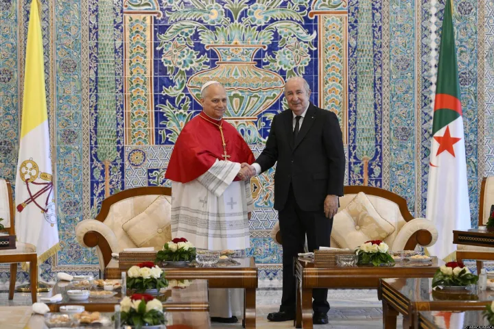 Pope Leo XIV is welcomed by President of the People's Democratic Republic of Algeria, Abdelmadjid Tebboune as he arrives in Algiers, Algeria on April 13, 2026. The pope begins his third and longest-yet Apostolic Journey, which takes him to four countries on the African continent: Algeria, Cameroon, Angola, and Equatorial Guinea. Photo by (EV) Simone Risoluti/ Vatican Media/ABACAPRESS.COM Photo: ABACA/ABACA