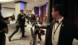 Employees, Secret Service and members of staff flee in the Washington Hilton after shots were heard during the White House Correspondents' Dinner in Washington, DC, on April 25, 2026. Shots were fired as President Donald Trump attended a press dinner for the first time as President. Photo by Yuri Gripas/UPI Photo via Newscom Photo: Yuri Gripas/NEWSCOM