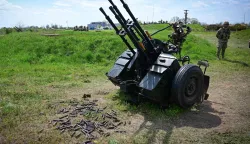A Romanian army's MR-4 quadruple anti-aircraft machine gun during exercise EASTERN PHOENIX 26, a training activity designed to test counter-unmanned aircraft systems (C-UAS) procedures, at Capu Midia firing range, April 24, 2026. The exercise, which includes NATO?s first "Crucible Series" event, aims to strengthen national defense and NATO?s Eastern Flank by integrating kinetic and non-kinetic responses to airspace incursions with special interest in the testing of anti-drones measures. Participants included aproximately 250 Romanian military personnel and 250 industry representatives from 21 NATO allied nations. (Photo by Daniel MIHAILESCU/AFP)