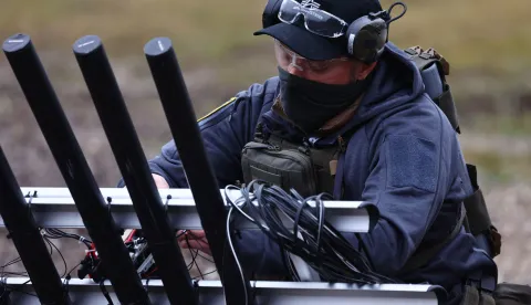 epa12569555 Team Fiberdome presents electromagnetic drone defense as their advanced prototype for defending against electronic attacks on unmanned systems on the final day of the Spectra Challenge in Erding, Germany, 04 December 2025. The Spectra Challenge, a joint initiative of the Agency for Innovation in Cybersecurity GmbH (Cyber ​​Agency), the German Armed Forces' Cyber ​​Innovation Hub (CIHBw), and the Innovation Lab System Soldier (InnoLabSysSdt), promotes technological innovations for protecting drones and other autonomous systems from electronic threats such as jamming, spoofing, and signal interception. The goal is to effectively integrate research and application in order to develop operational protection mechanisms in a short timeframe. EPA/ANNA SZILAGYI