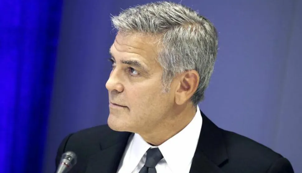 epa05549978 US actor George Clooney attends the Private Sector Call to Action Leaders Summit for Refugees on the sidelines of the General Debate of the 71st Session of the United Nations General Assembly at UN headquarters in New York, New York, USA, 20 September 2016. EPA/PETER FOLEY/POOL------MOZAIK, 3 stupca