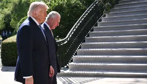 US President Donald Trump (L) greets Britain's King Charles III upon arrival at the South Portico of the White House in Washington, DC, on April 27, 2026. (Photo by Brendan SMIALOWSKI/AFP)