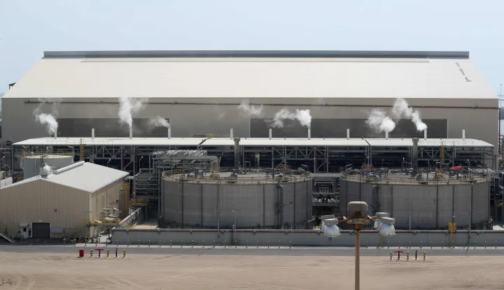 (FILES) This picture shows the Ras Laffan Industrial City, Qatar's principal site for production of liquefied natural gas and gas-to-liquid, administrated by Qatar Petroleum, some 80 kilometers (50 miles) north of the capital Doha, on February 6, 2017. Tehran on March 19, 2026, has carried out a series of attacks on Gulf energy sites, including on Qatar's huge Ras Laffan LNG facility, in retaliation for an Israeli strike on Iran's South Pars gas field -- part of the world's largest natural gas reservoir. (Photo by KARIM JAAFAR/AFP)