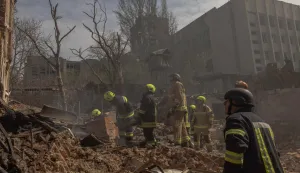 Ukrainian rescuers work at the site of heavily damaged buildings following a Russian air attack in Dnipro, on April 16, 2026, amid the Russian invasion of Ukraine. Massive Russian strikes on Ukraine left at least 19 people dead overnight from April 15 to April 16, particularly in Kyiv and Odesa, Ukrainian authorities said on April 16, 2026, describing these attacks as among the deadliest in recent weeks. (Photo by Roman PILIPEY/AFP)