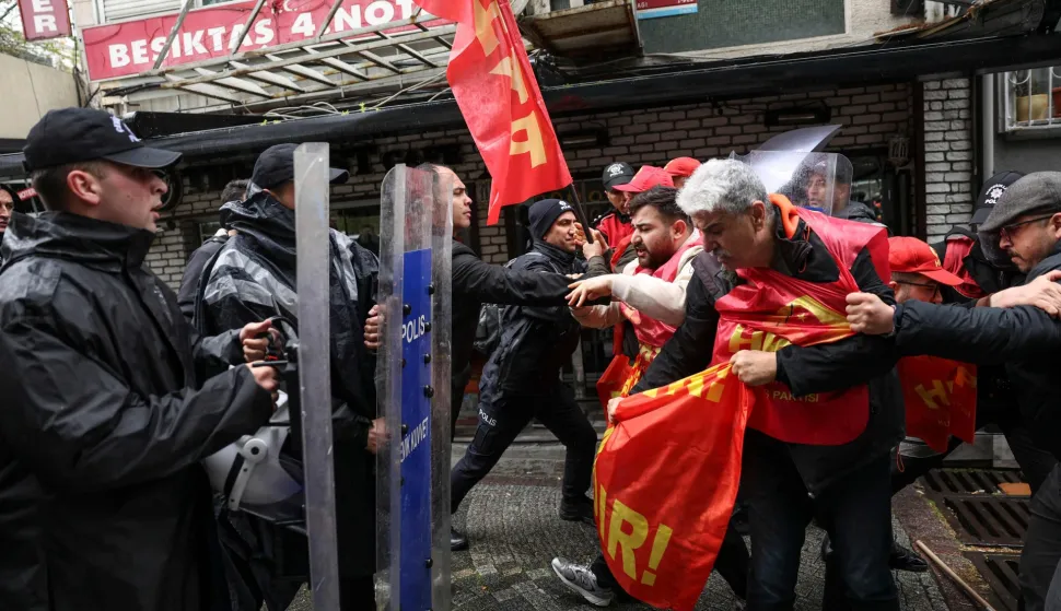 Turkish police scuffle with protestors during a May Day (Labour Day) rally, marking international Workers' Day, in Besiktas, a district of Istanbul, on May 1, 2026. (Photo by BERK OZKAN/AFP)