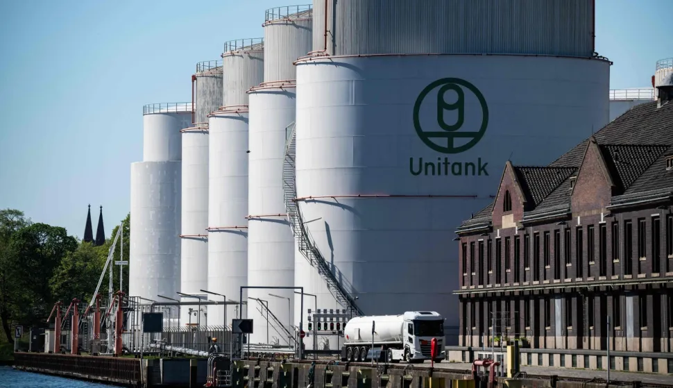 A fuel truck leaves a storage facility for oil products owned by oil logistics company Unitank at the BEHALA freight hub in Berlin on April 22, 2026. (Photo by John MACDOUGALL/AFP)