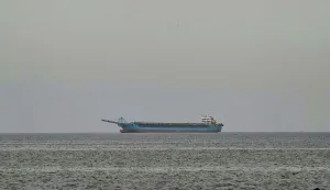 A ship is seen off the coast of Sharjah, the day after the failure of US-Iran peace talks on April 13, 2026. The failure of US-Iran peace talks has left the US President with several unpalatable options, as analysts say his order to blockade the strategic Strait of Hormuz could further complicate his next move on April 12, 2026. Any hopes that US Vice President would emerge from the marathon day of negotiations with top Iranian officials with a deal to end a war that has rippled across the Middle East were dashed when he left hosts Pakistan emptyhanded. (Photo by AFP)