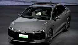 German carmaker AUDI's new AUDI A6L e-tron electric car model is presented at an event ahead of the Beijing Auto Show in Beijing on April 21, 2026. (Photo by Pedro PARDO/AFP)