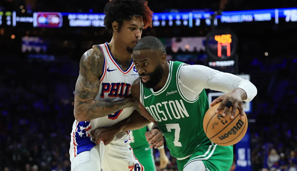 PHILADELPHIA, PENNSYLVANIA - APRIL 30: Jaylen Brown #7 of the Boston Celtics drives around Kelly Oubre Jr. #9 of the Philadelphia 76ers during the third quarter in Game Six of the First Round of the NBA Eastern Conference Playoffs at Xfinity Mobile Arena on April 30, 2026 in Philadelphia, Pennsylvania. NOTE TO USER: User expressly acknowledges and agrees that, by downloading and or using this photograph, User is consenting to the terms and conditions of the Getty Images License Agreement. Elsa/Getty Images/AFP (Photo by ELSA/GETTY IMAGES NORTH AMERICA/Getty Images via AFP)