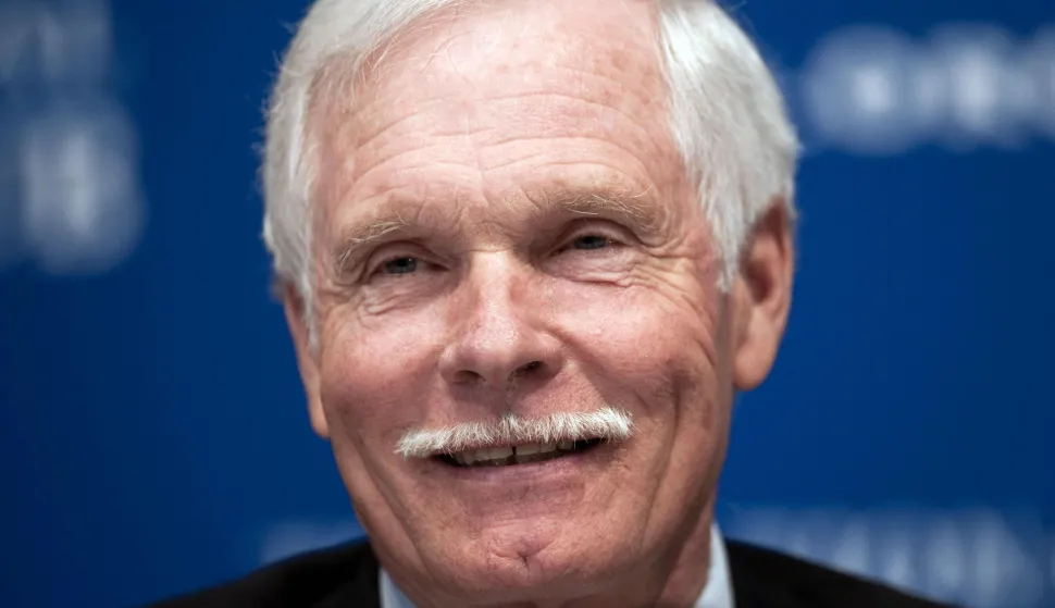 (FILES) CNN founder and Ted Turner Enterprises chairman Ted Turner attends a debate on US energy policy with BP Capitol foundrer T. Boone Pickens at the National Press Club in Washington on April 19, 2011. CNN announced on May 6, 2026, that pioneering CNN founder Ted Turner has died at age 87. (Photo by Nicholas KAMM/AFP)