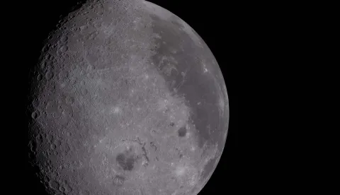 This handout picture released on April 8, 2026, by NASA shows a view of the Moon, including the Orientale basin and the dark lava plains visible, as seen from the Orion spacecraft on April 6, 2026. The Artemis II astronauts wrapped up their lunar flyby as they continue their journey back to Earth on Tuesday, bringing with them rich celestial observations including little-known lunar craters, a solar eclipse and meteor strikes that scientists hope will open doors. (Photo by Handout/NASA/AFP)/RESTRICTED TO EDITORIAL USE - MANDATORY CREDIT "AFP PHOTO/NASA" - HANDOUT - NO MARKETING NO ADVERTISING CAMPAIGNS - DISTRIBUTED AS A SERVICE TO CLIENTS
