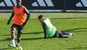 (FILES) Real Madrid's French midfielder #14 Aurelien Tchouameni (L) and Real Madrid's Uruguayan midfielder #08 Federico Valverde take part in a training session at Real Madrid Sports City in Valdebebas, in the outskirts of Madrid, on December 30, 2025. Real Madrid announced on May 8, 2026 the opening of disciplinary proceedings to two of its players, the Uruguayan Fede Valverde and the French Aurelien Tchouameni, who would have been involved in a violent altercation that sent the first one to the hospital for a small bleeding wound. (Photo by Pierre-Philippe MARCOU/AFP)