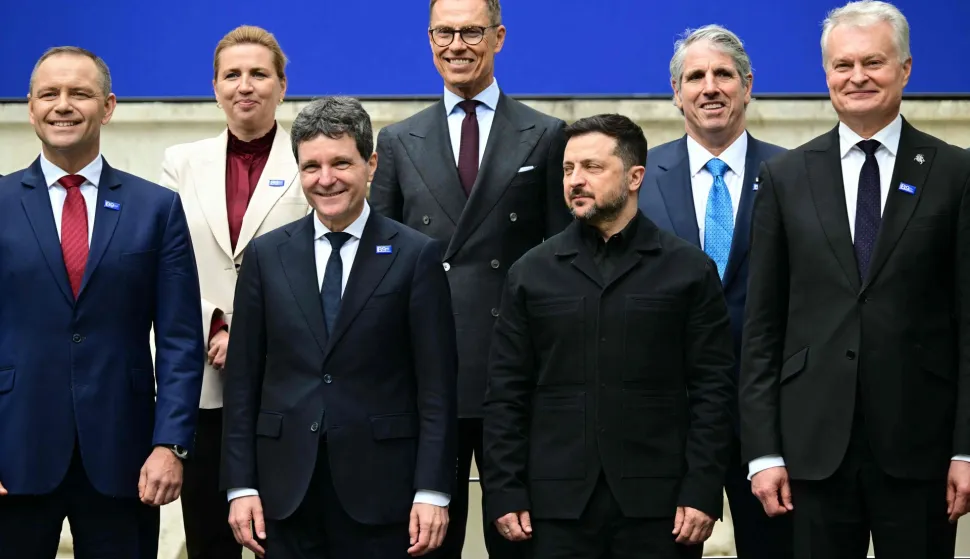 (From L) Poland's President Karol Nawrocki, Denmark's Prime Minister Mette Frederiksen, Romania's President Nicusor Dan, Finland's President Alexander Stubb, Ukraine's President Volodymyr Zelensky, US Under Secretary of State for Arms Control and International Security Thomas DiNanno and Lithuania's President Gitanas Nauseda pose for a family picture during the summit of the Bucharest Nine (B9) and the Nordic countries at the Cotroceni Palace in Bucharest, Romania on May 13, 2026. The event is under the overarching theme of 'Delivering More for Transatlantic Security' and will focus on transatlantic security and NATO?s forthcoming summit in Ankara. The B9 format, also known as NATO's Eastern Flank, includes Bulgaria, the Czech Republic, Estonia, Hungary, Latvia, Lithuania, Poland, Romania and Slovakia. (Photo by Daniel MIHAILESCU/AFP)