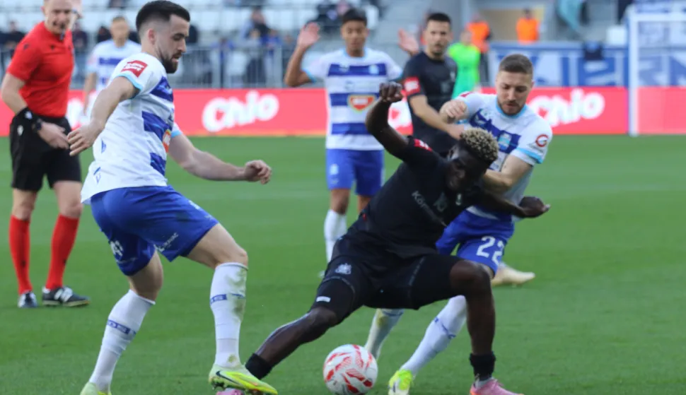 Osijek 14. 03. 2026, Opus Arena, nogomet, Osijek - Gorica, SuperSport HNL 25/26. Arnel Jakupović (17) i Roko Juri&scaron;ić (22).snimio GOJKO MITIĆ