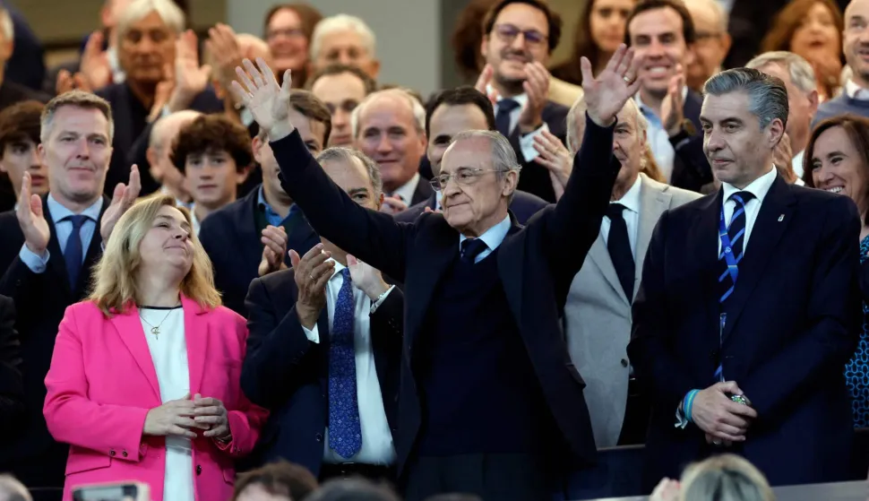 Real Madrid president Florentino Perez (C) waves from the stands before the Spanish league football match between Real Madrid CF and Real Oviedo at Santiago Bernabeu Stadium in Madrid on May 14, 2026. Real Madrid officially started their electoral process today, after president Florentino Perez announced his decision to call elections, in which he will stand. There is a 10-day window, until May 23, for the submission of candidacies, Madrid said in a statement. Among the requirements to be a candidate are having been a club member for 20 years and providing a guarantee of 187 million euros ($219m), equivalent to 15 percent of the club's annual budget, which must be backed by personal assets. (Photo by Oscar DEL POZO/AFP)