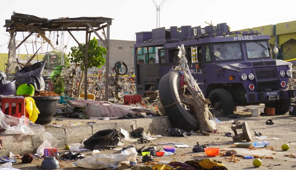 (FILES) A general view of an armoured Police vehicle at a market in Maiduguri on March 17, 2026 a day after blasts in the city. Nigeria is facing renewed violence from armed groups as the country heads toward elections, with assaults in the northeast killing high-ranking officers and analysts warning of the entrenchment of foreign jihadists in the west.Insecurity has long been an issue, from "bandit" kidnapping gangs, farmer-herder violence, a smouldering southeastern separatist conflict and a 17-year jihadist insurgency. (Photo by AFP)