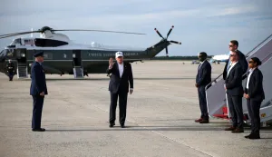 JOINT BASE ANDREWS, MARYLAND - MAY 15: U.S. President Donald Trump waves after stepping off Air Force One on May 15, 2026 at Joint Base Andrews, Maryland. President Trump is returning to Washington from his trip to China, where he and President Xi addressed ways to enhance bilateral economic cooperation and investment, and agreed that Iran should not be allowed to have a nuclear weapon. Alex Wong/Getty Images/AFP (Photo by ALEX WONG/GETTY IMAGES NORTH AMERICA/Getty Images via AFP)