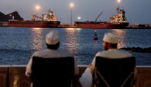 FILE PHOTO: The Galaxy Globe bulk carrier and the Luojiashan tanker sit anchored as Iran vows to close the Strait of Hormuz, amid the U.S.-Israeli conflict with Iran, in Muscat, Oman, March 9, 2026. REUTERS/Benoit Tessier/File Photo Photo: BENOIT TESSIER/REUTERS