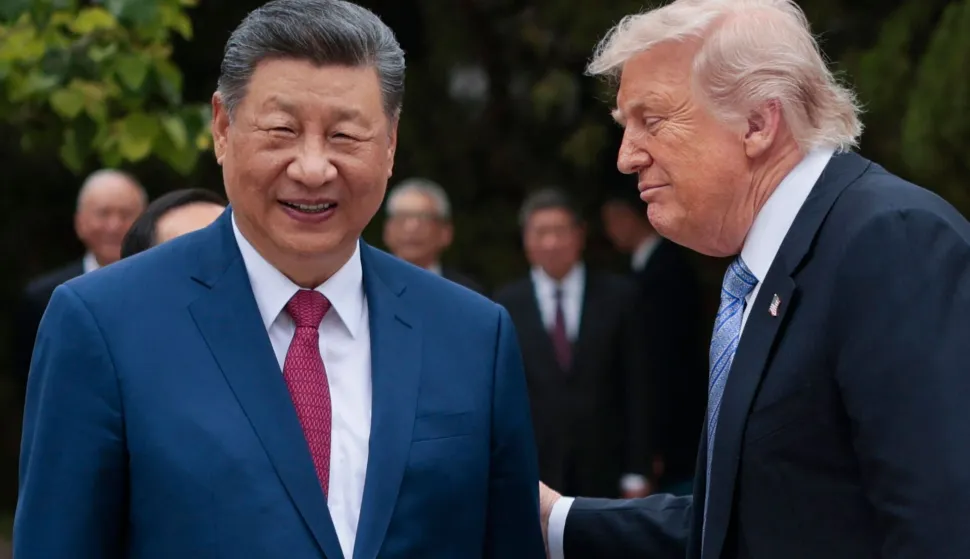 US President Donald Trump (R) speaks with China?s President Xi Jinping as he leaves after a visit to Zhongnanhai Garden in Beijing on May 15, 2026. (Photo by Evan Vucci/POOL/AFP)