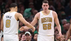 Apr 12, 2026; Boston, Massachusetts, USA; Boston Celtics forward Luka Garza (52) celebrates with Boston Celtics guard John Tonje (8) during the first half at TD Garden. Mandatory Credit: Paul Rutherford-Imagn Images Photo: Paul Rutherford/REUTERS
