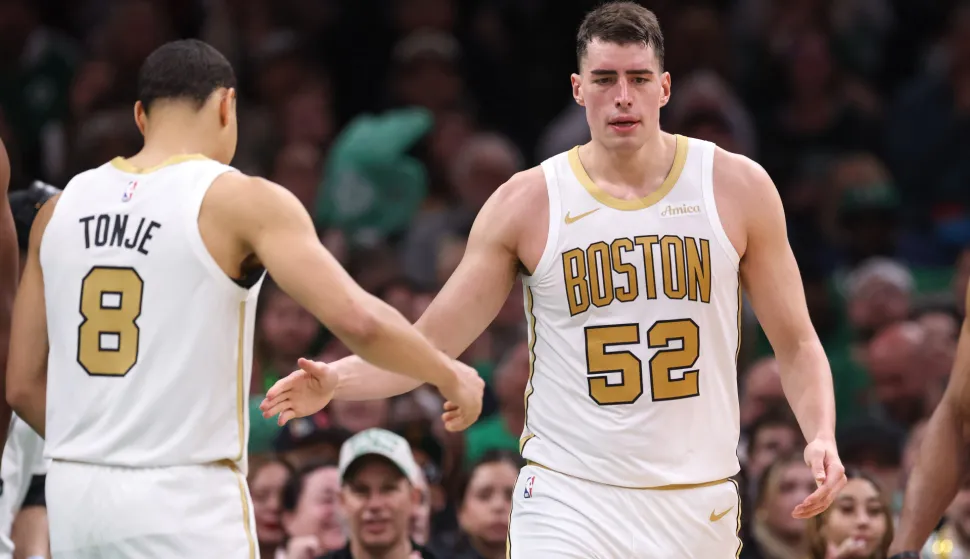 Apr 12, 2026; Boston, Massachusetts, USA; Boston Celtics forward Luka Garza (52) celebrates with Boston Celtics guard John Tonje (8) during the first half at TD Garden. Mandatory Credit: Paul Rutherford-Imagn Images Photo: Paul Rutherford/REUTERS