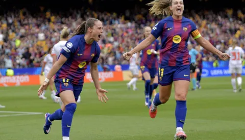 Barcelona's Polish forward #17 Ewa Pajor celebrates with Barcelona's Spanish midfielder #11 Alexia Putellas (R) scoring her team's third goal during the UEFA Women's Champions League semi-final second leg football match between FC Barcelona and Bayern Munich at Camp Nou Stadium in Barcelona on May 3, 2026. (Photo by MANAURE QUINTERO/AFP)