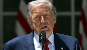 (FILES) US President Donald Trump speaks during a Mother's Day luncheon in the Rose Garden of the White House in Washington, DC, on May 8, 2026. US President Donald Trump said on May 23 that Iran and the US had "largely negotiated" a deal that included opening the Strait of Hormuz, but the draft was "subject to finalization." (Photo by Jim WATSON/AFP)