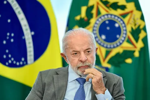 Brazil's President Luiz Inacio Lula da Silva looks on during the signing into law of a bill establishing a National Day of Remembrance for the Victims of COVID-19 in Brasilia on May 11, 2026. (Photo by Evaristo Sa/AFP)