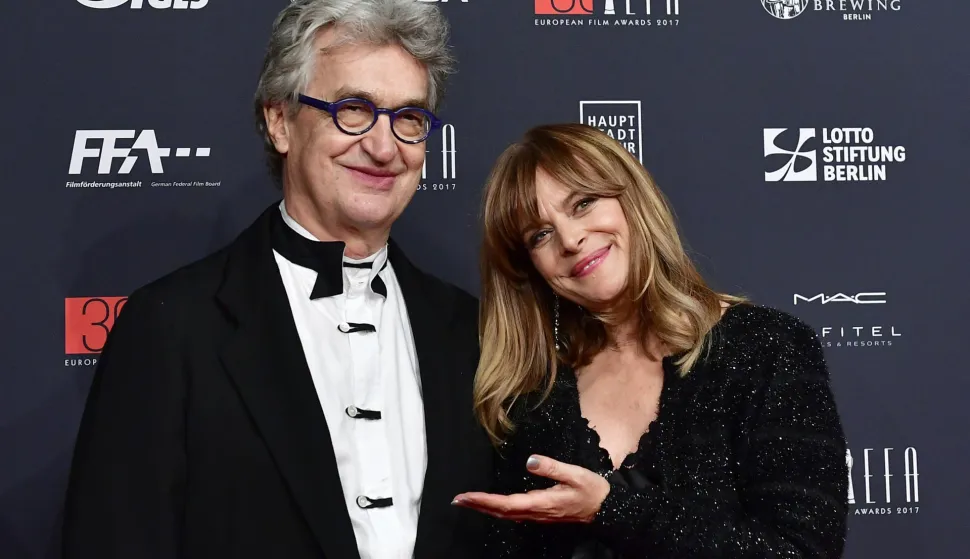 (ALTERNATIVE CROP) - German director Wim Wenders (L) and German actress Nastassja Kinski pose upon arrival for the 30th European Film Awards in Berlin, on December 9, 2017. German director Wim Wenders said on June 3, 2026 he was withdrawing his 1975 film "Wrong Move" after actress Nastassja Kinski complained about a scene in which she appeared wearing almost nothing when she was 13 years old. (Photo by Tobias SCHWARZ/AFP)/ALTERNATE CROP