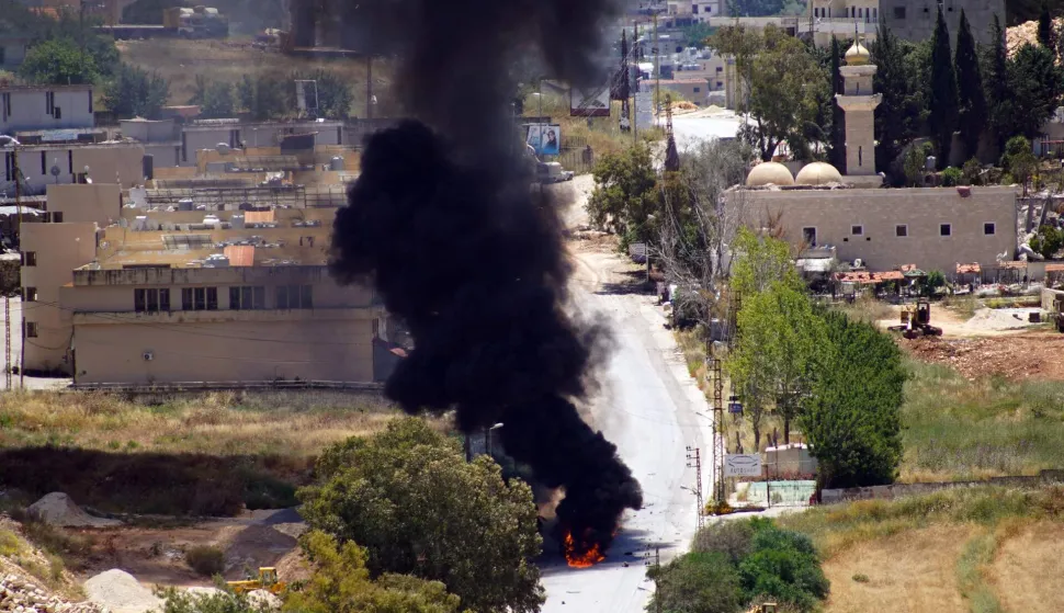 Smoke rises from a vehcile targeted by an Israeli drone attack in the southern Lebanese city of Nabatieh on June 5, 2026. Israeli strikes overnight in the south Lebanon city of Tyre killed seven people, a source from Lebanon's civil defence told AFP on June 5, despite a ceasefire in the Israel-Hezbollah war. (Photo by Abbas Fakih/AFP)