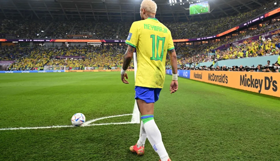 (FILES) Brazil's forward #10 Neymar prepares to shoot a corner kick during the Qatar 2022 World Cup round of 16 football match between Brazil and South Korea at Stadium 974 in Doha on December 5, 2022. Brazil superstar Neymar was handed a dramatic recall to the country's World Cup squad on May 18, 2026, returning to the national team after a near three-year absence. (Photo by MANAN VATSYAYANA/AFP)
