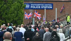 Demonstrators protest outside of Southampton Central Police Station in Southampton, southern England, on June 2, 2026, following the conviction of Vickrum Digwa for the murder of Henry Nowak. Body camera footage of a dying student who was handcuffed by British police after being stabbed by a Sikh man and falsely accused of racially abusing his murderer sparked outrage Tuesday. (Photo by JUSTIN TALLIS/AFP)